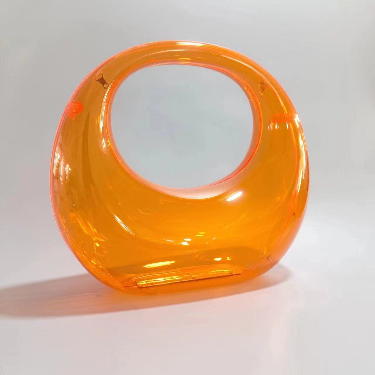 crescent acrylic clutch