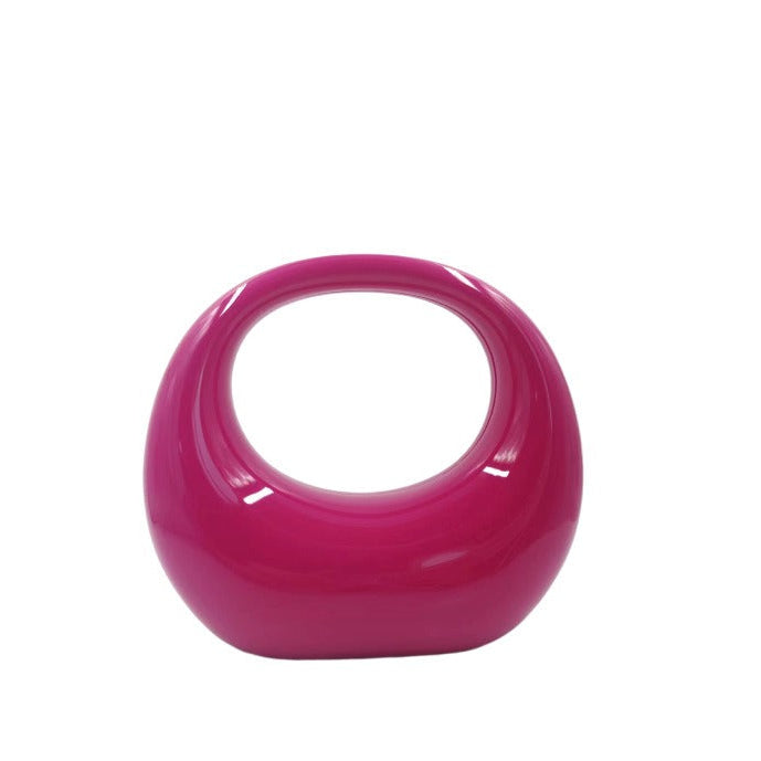 crescent acrylic clutch