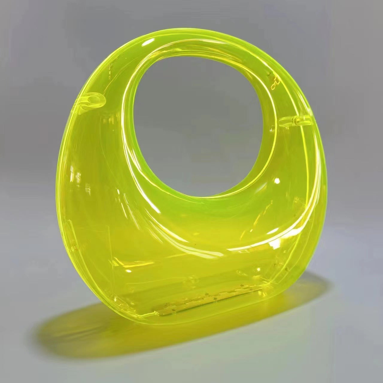 crescent acrylic clutch