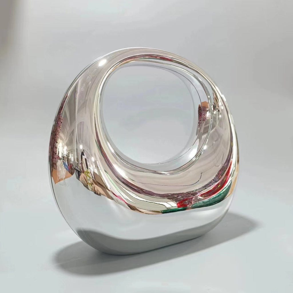 crescent acrylic clutch