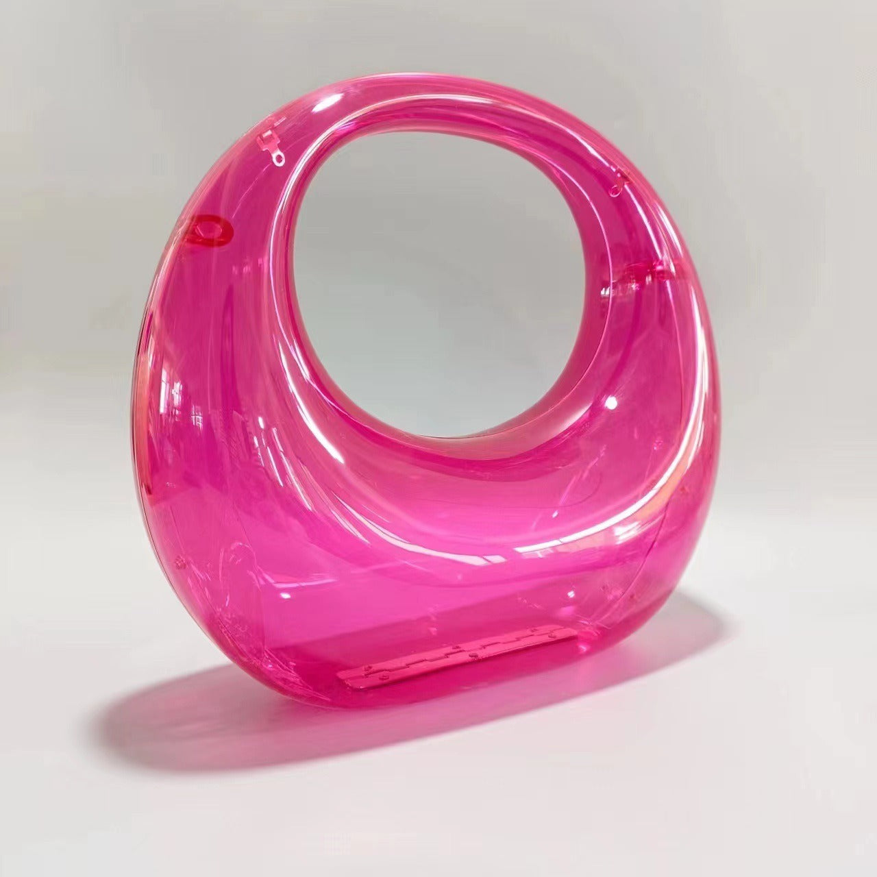 crescent acrylic clutch