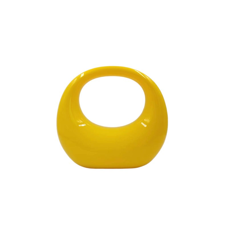 crescent acrylic clutch
