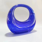 crescent acrylic clutch