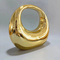 crescent acrylic clutch