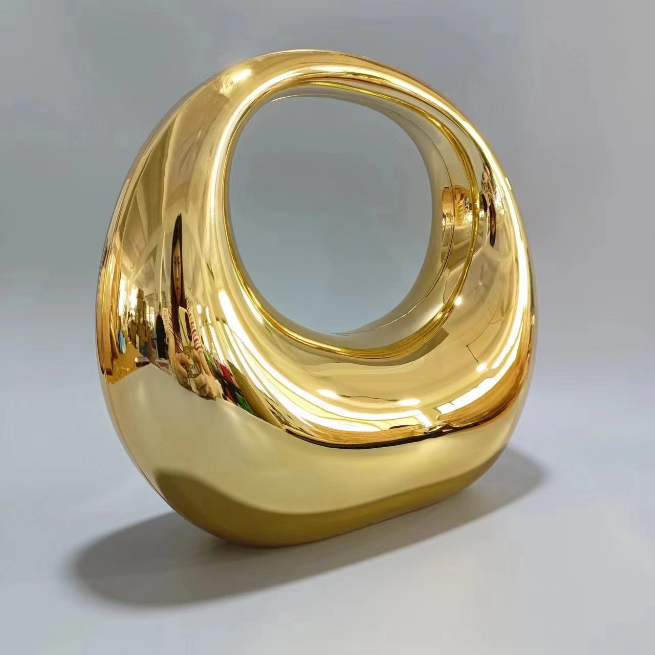 crescent acrylic clutch