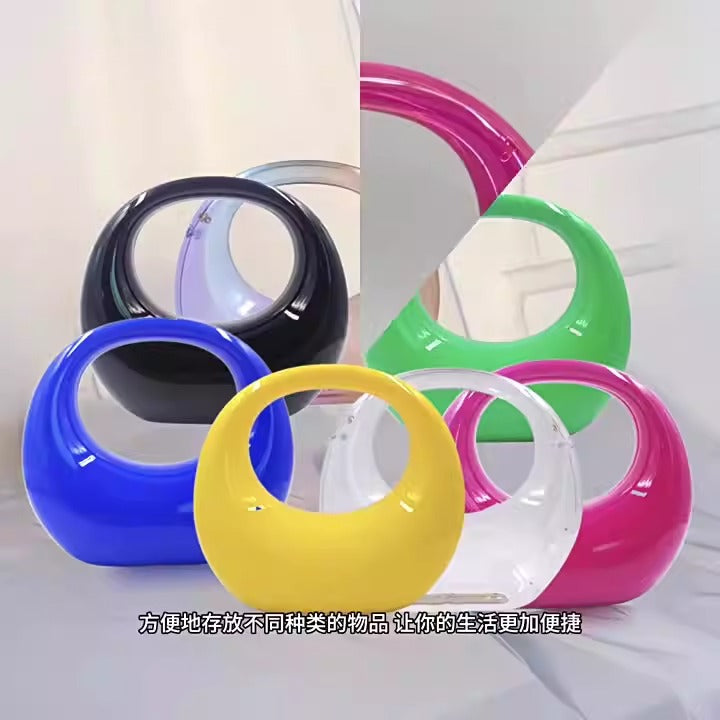 crescent acrylic clutch