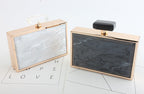 perfume bottle clutch bag