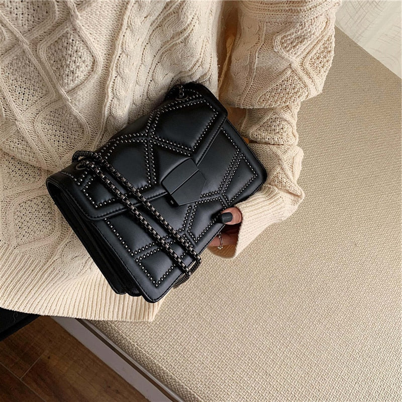rivet chain crossbody bag
