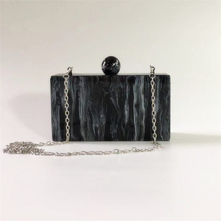 marbled acrylic clutch