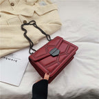 rivet chain crossbody bag