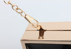 perfume bottle clutch bag