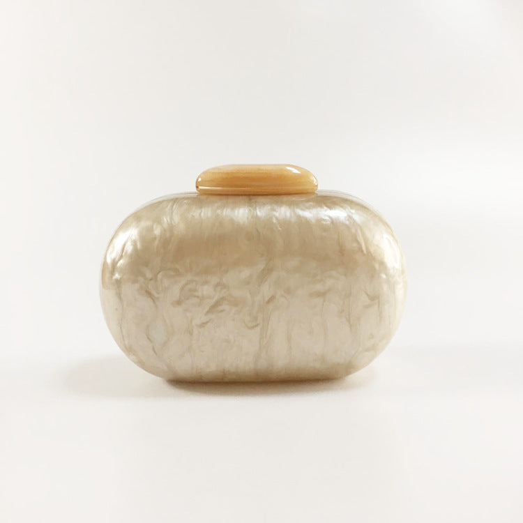 oval acrylic clutch bag